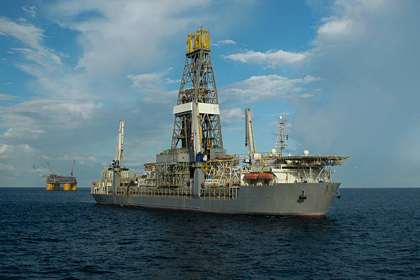 Drill ship and offshore production platform stock photo