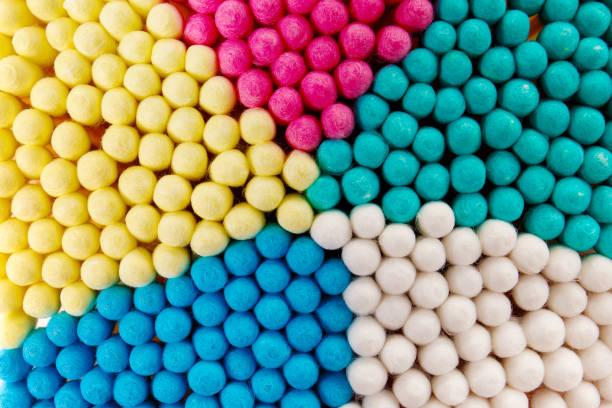 istock Background of multi-colored cotton swabs, sticks, buds. Macro shot. 1713633892