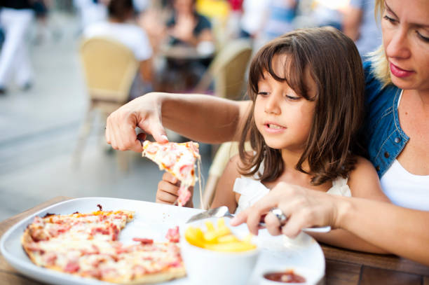istock Little Girl Enjoying her Meal 171363741