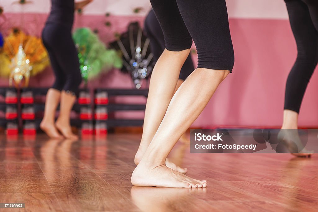 Dancer's legs Group of dancers practicing, Focus on legs. Activity Stock Photo