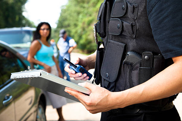 istock Policemen and woman during traffic stop 171365106