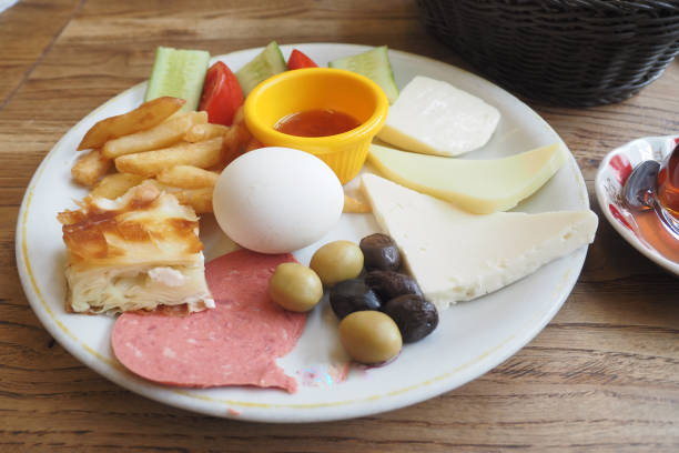 Food prepared with green plantain, cheese and chicharron.