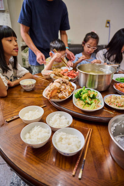 istock An multi-generation Asia family eat dinner together. 1713653801