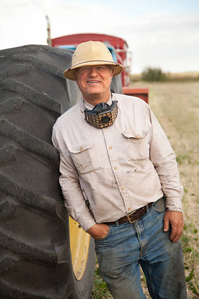 istock Farmer in Field at Harvest 171365523