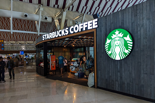 Makassar, Indonesia - October 1, 2023: Starbucks coffee shop in the Sultan Hasanudin airport terminal area, Makassar