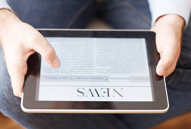 istock man reading news on the digital tablet 171365833