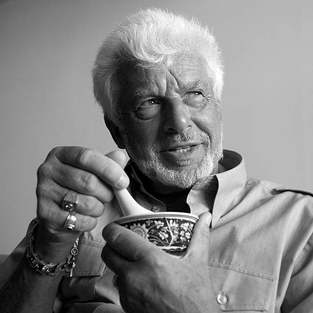 старший мужчина пить суп - kane стоковые фото и изображения