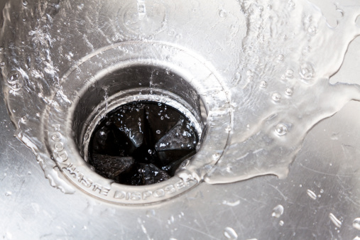 Stainless steal kitchen sink with water drops