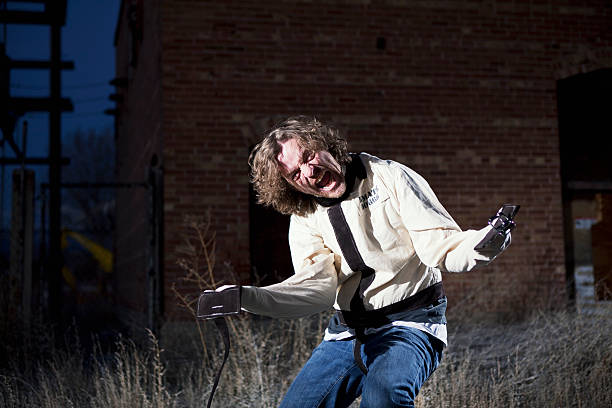 istock Mental Patient in Straightjacket 171366415