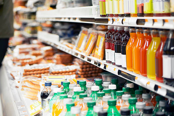 Refrigerated foods Refrigerated foods in store. non alcoholic beverage stock pictures, royalty-free photos & images