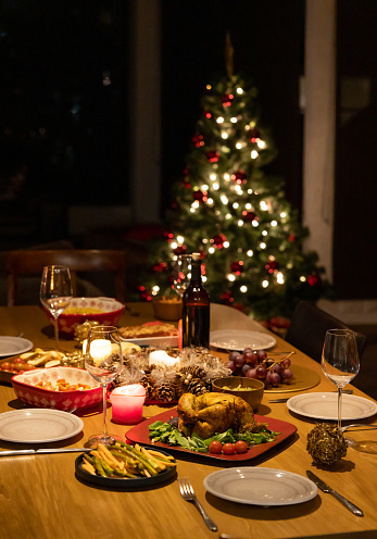 Beautiful Christmas dinner served on the table - happy holidays concepts