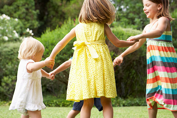 istock Group Of Children Playing Outdoors Together 171367007