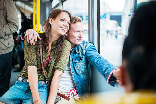 istock Young couple in a bus looking through window. 171367391