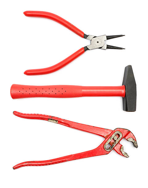 trois rouge outils de travail - adjustable wrench wrench clipping path red photos et images de collection