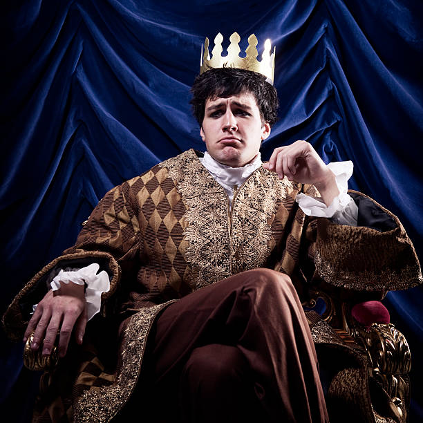 Pouting King One unhappy king. throne stock pictures, royalty-free photos & images