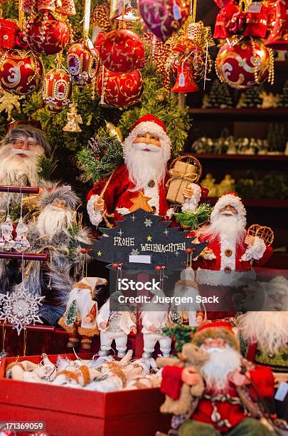 Santa Claus And Xmas Decoration At The Christmas Market Stock Photo - Download Image Now