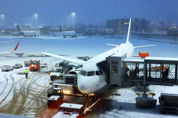 istock White passenger jetliner on the airport in winter time 1713691521