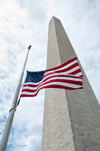 istock The Washington Monument in DC with American Flag 171369155