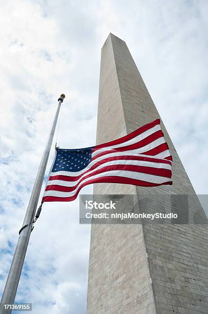 The Washington Monument In Dc With American Flag Stock Photo - Download Image Now - Half-mast, American Flag, Architecture