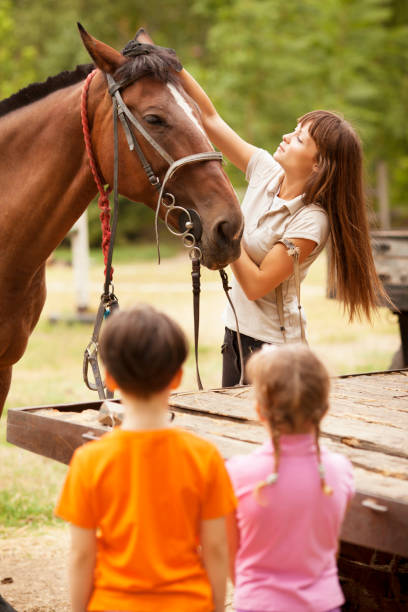 istock Children Meeting With Horses. 171369211
