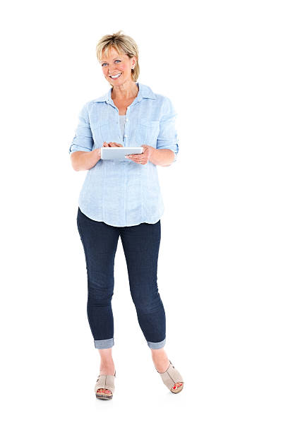 istock Beautiful mature lady with a tablet computer 171369636