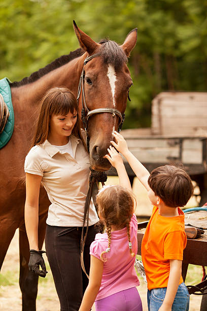 istock Children Meeting With Horses. 171370311