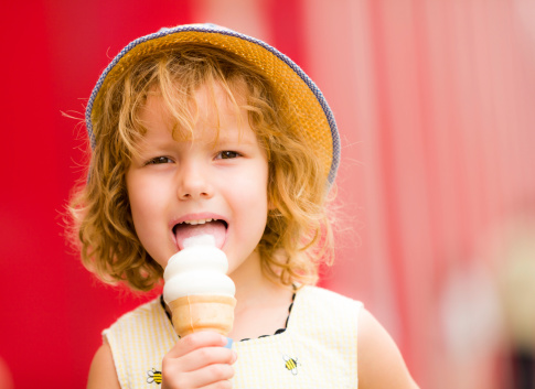 Picture of lovely girl eating ice cream