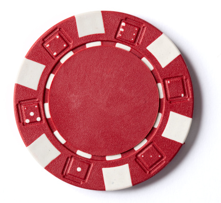 A picture of a poker chip on a white background.