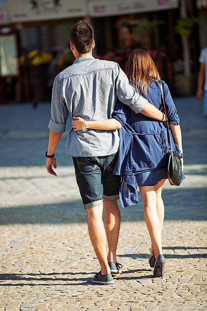 istock Couple Walking In Town Square 171371863