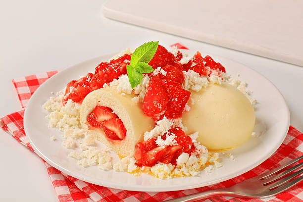 sweet strawberry dumplings with a curd stock photo