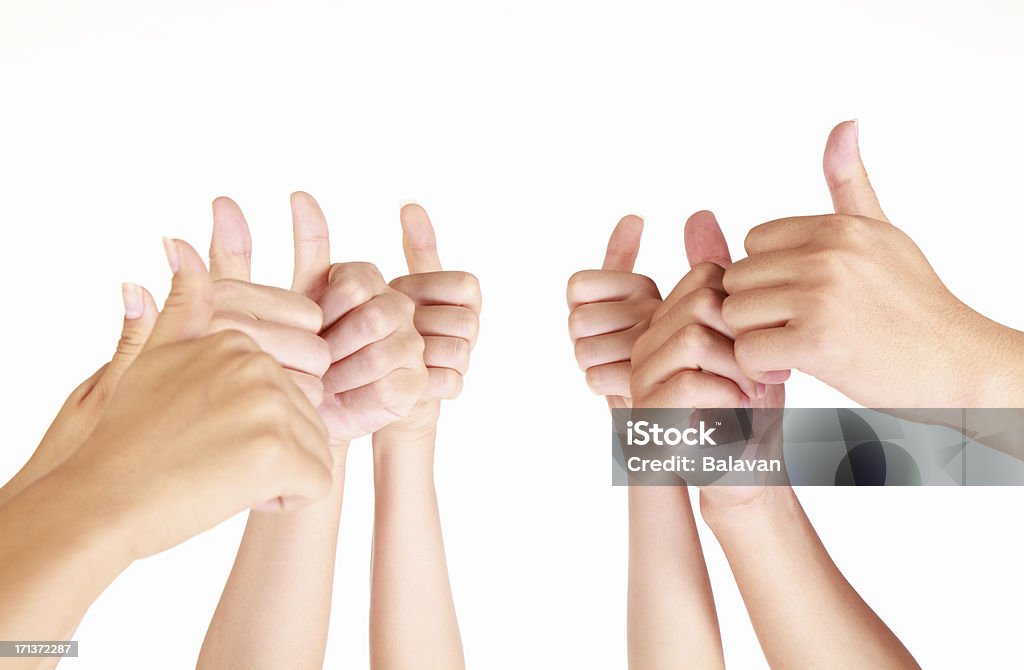 Pulgares arriba sobre fondo blanco - Foto de stock de Pulgar hacia arriba libre de derechos