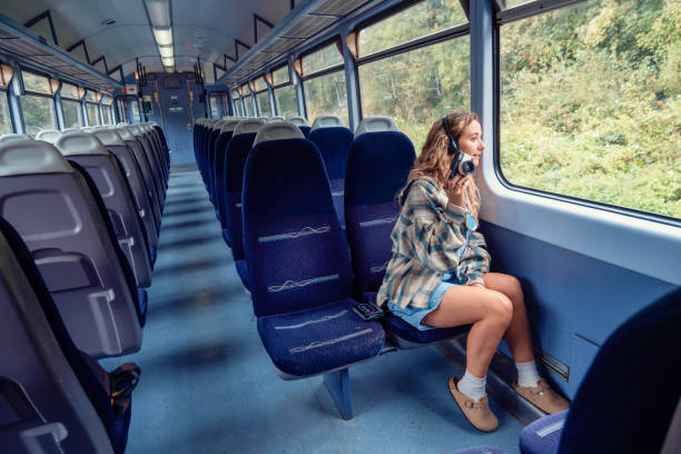istock A lone young woman on a commuter train 1713723661