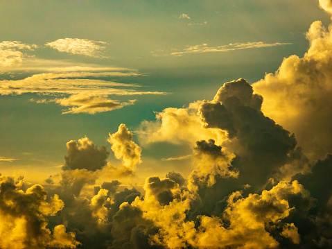 Evening cloudscape in summer, with a cloud top shaped like the head of a dog, in southwest Florida. A tendency to impose meaning on a nebulous visual stimulus such as a cloud is called pareidolia.