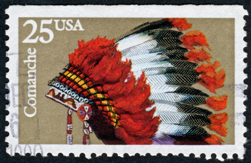 Cancelled Stamp From The United States Featuring A Native American Comanche Headdress.