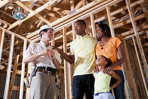 istock Family in house under construction with builder 171373197