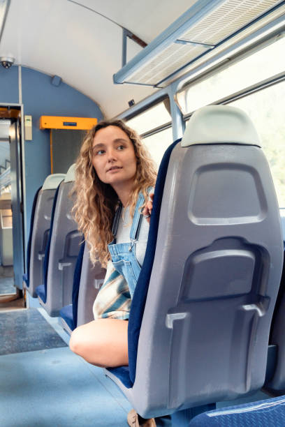 istock Blond woman on train looks back 1713734215