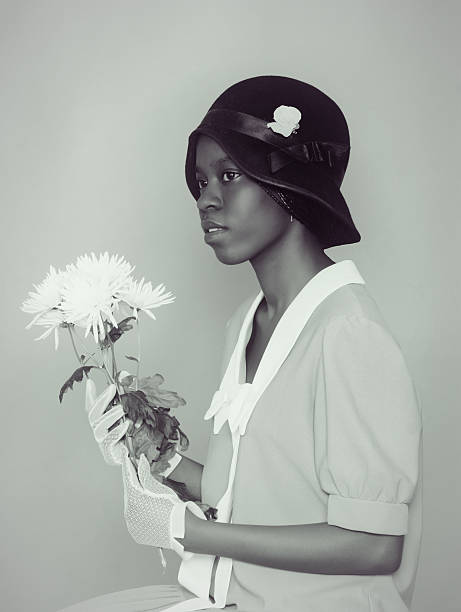 Flapper girl. True Serenity Emulation of vintage style photography.Contain grain for more vintage effect. flapper hat stock pictures, royalty-free photos & images