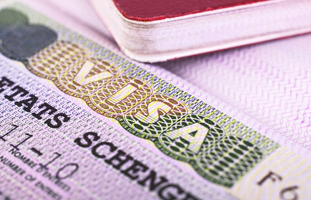 Passport and visa Passport and visa schengen agreement stock pictures, royalty-free photos & images