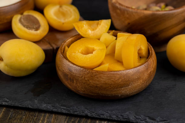 istock ripe yellow apricots on the table close-up 1713743725