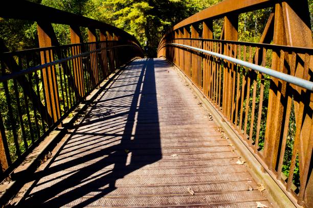 istock Metal footbridge in the midday sun. 1713745739