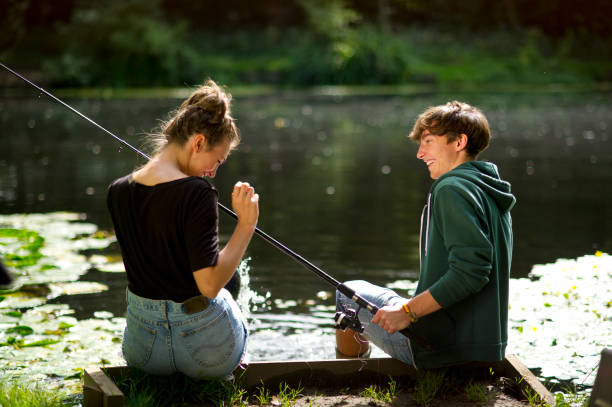 istock young fishing couple 171374619