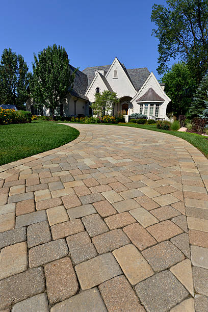 istock Driveway view of very large house 171374835