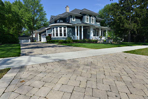 istock Large blue house on a lot with a long driveway 171375019