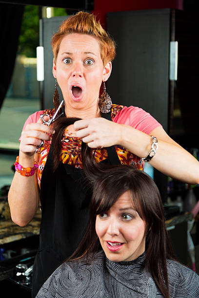 Hair Salon A woman unhappy with her hair cut. angry hairstylist stock pictures, royalty-free photos & images