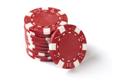 A picture of poker chips on a white background.