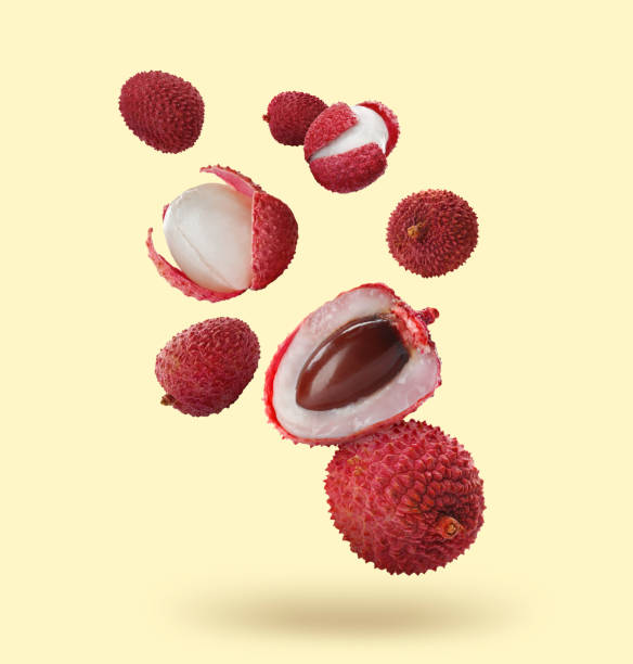 istock Many fresh lychees falling on beige background 1713752960