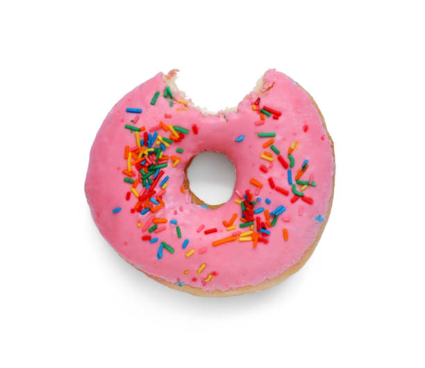 istock Sweet bitten glazed donut on white background, top view 1713753566
