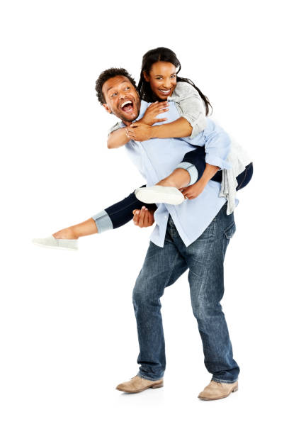 istock Happy boyfriend piggybacking his girlfriend on white 171375678