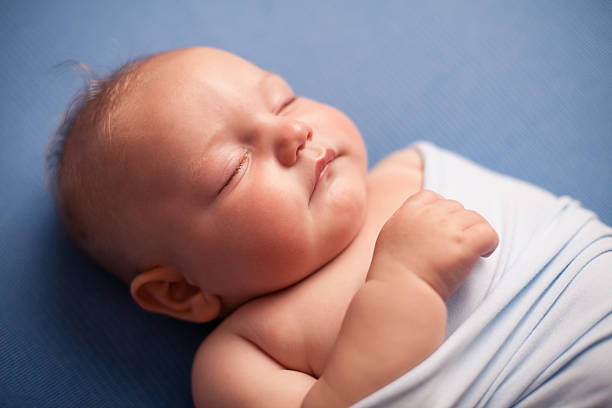 istock Color Image of Sleeping Baby Boy, on Blue Background 171376189