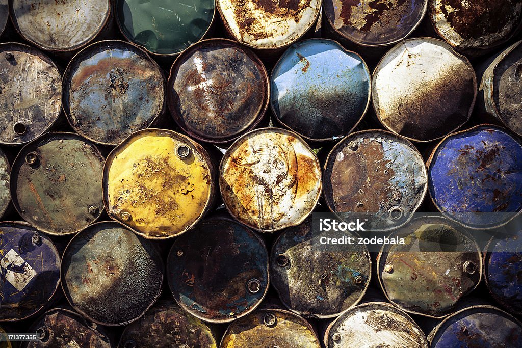 Pile of Weathered Oil Drums Pile of weathered oil drums Danger Stock Photo